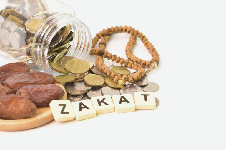 zakat word with stack of coins prayer beads and d 2022 11 02 16 34 22 utc